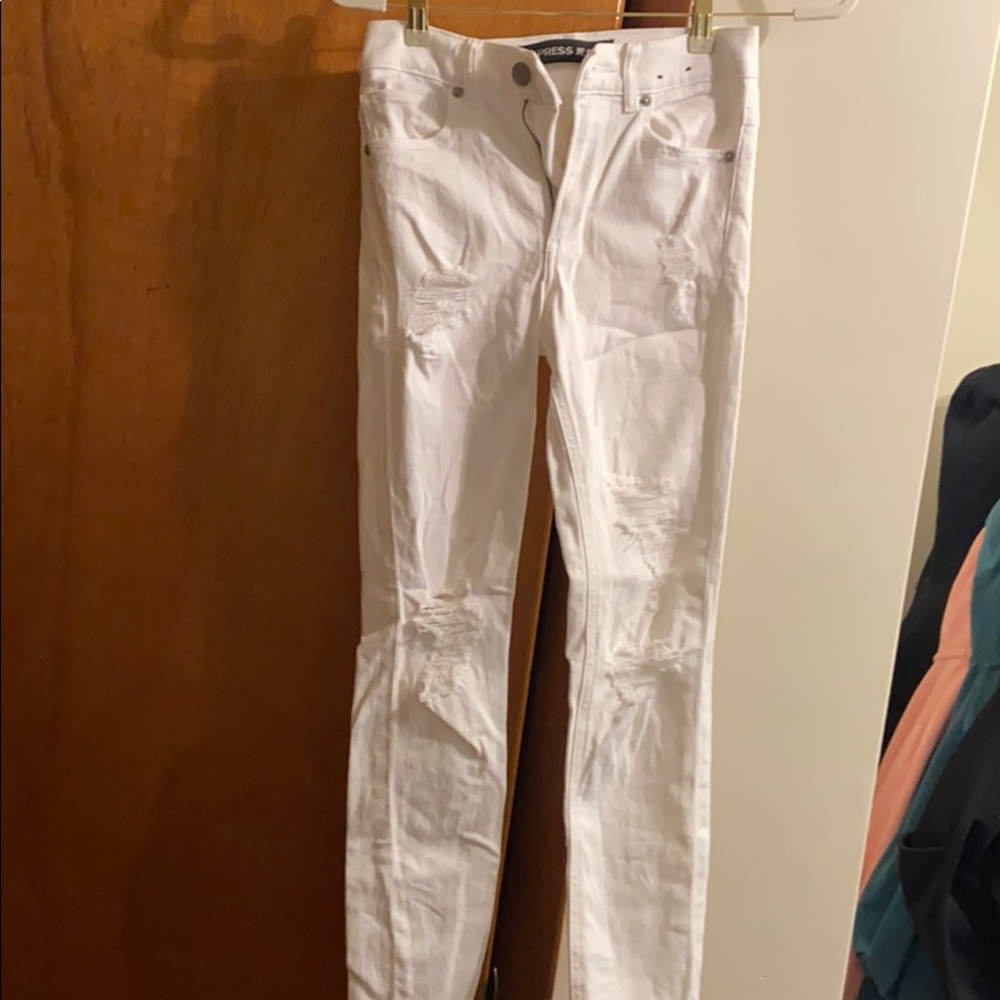 Never wornExpress white distressed skinny jeans 00